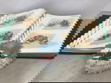 Art book full of prints with descriptions and handpainted sawblade signed Beining(6in.)