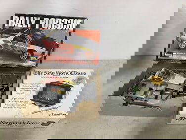 The New York Times touch screen sudoku and Revell Rally Porsche model car