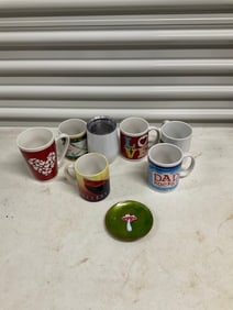 Lot of mugs with tea plate