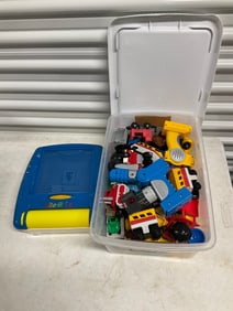 Lot of Fisher Price train cars and lite brite