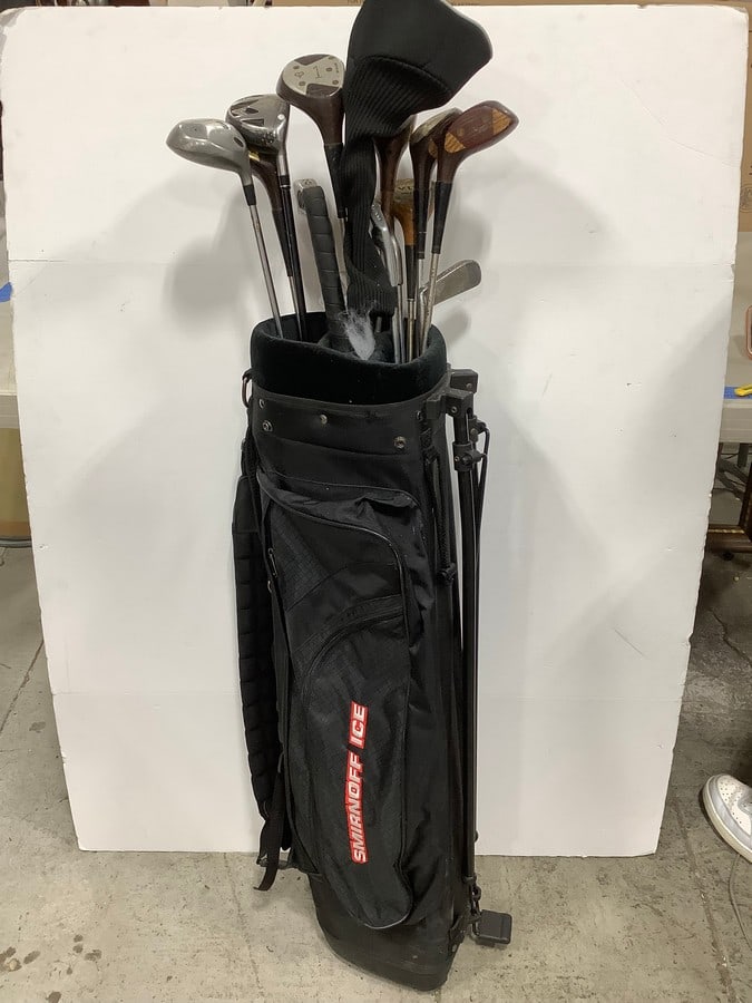 Various golf club with Smirnoff ice club bag: Various golf club with Smirnoff ice club bag