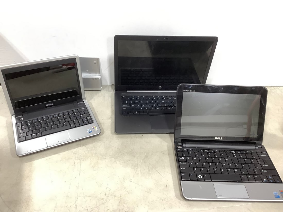 Dell mini computers, HP laptop, and battery pack (1 of 1)