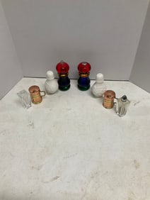 Lot of 4 salt and pepper shakers