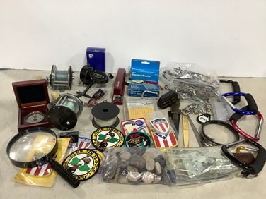 Various Fishing Reels, Stapler with Staples, Glasses, Various Badges, and more