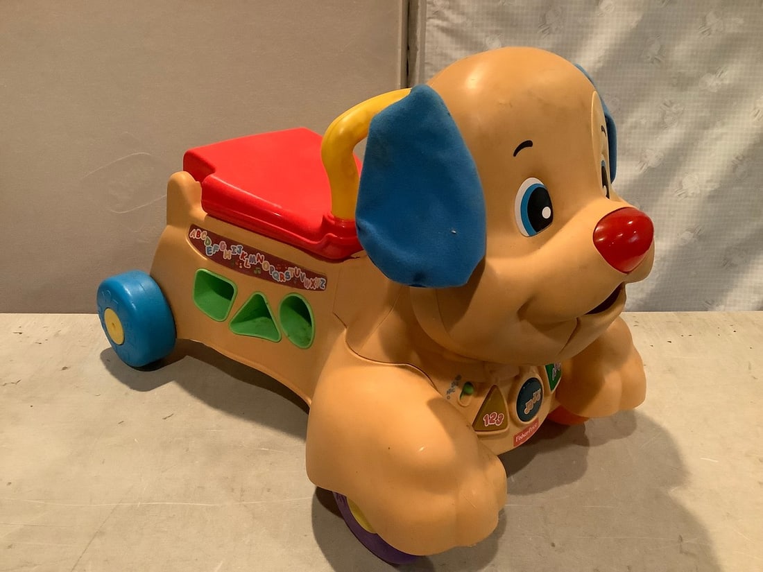 Fisher Price children's ride on dog toy: Fisher Price children's ride on dog toy