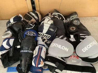Hockey pucks, gloves, and padding(Brine, Cathlon, Easton, and more)
