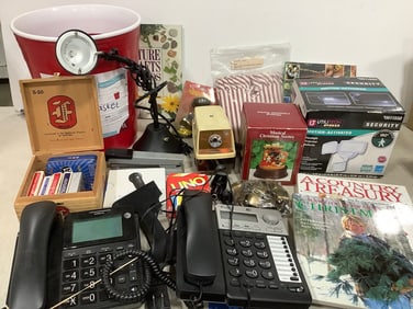 Various Card Games, Motion Activated Floodlight, Solo Cup Waste Basket, Panasonic Pencil Sharpener,