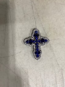 Sterling silver diamond chip blue stone cross