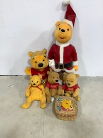 Winnie the Pooh dolls and basket(
