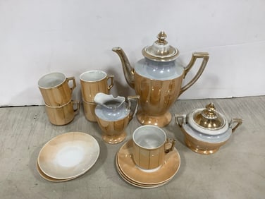Decorative cups, plates, pitcher, and more(8in.tallest)