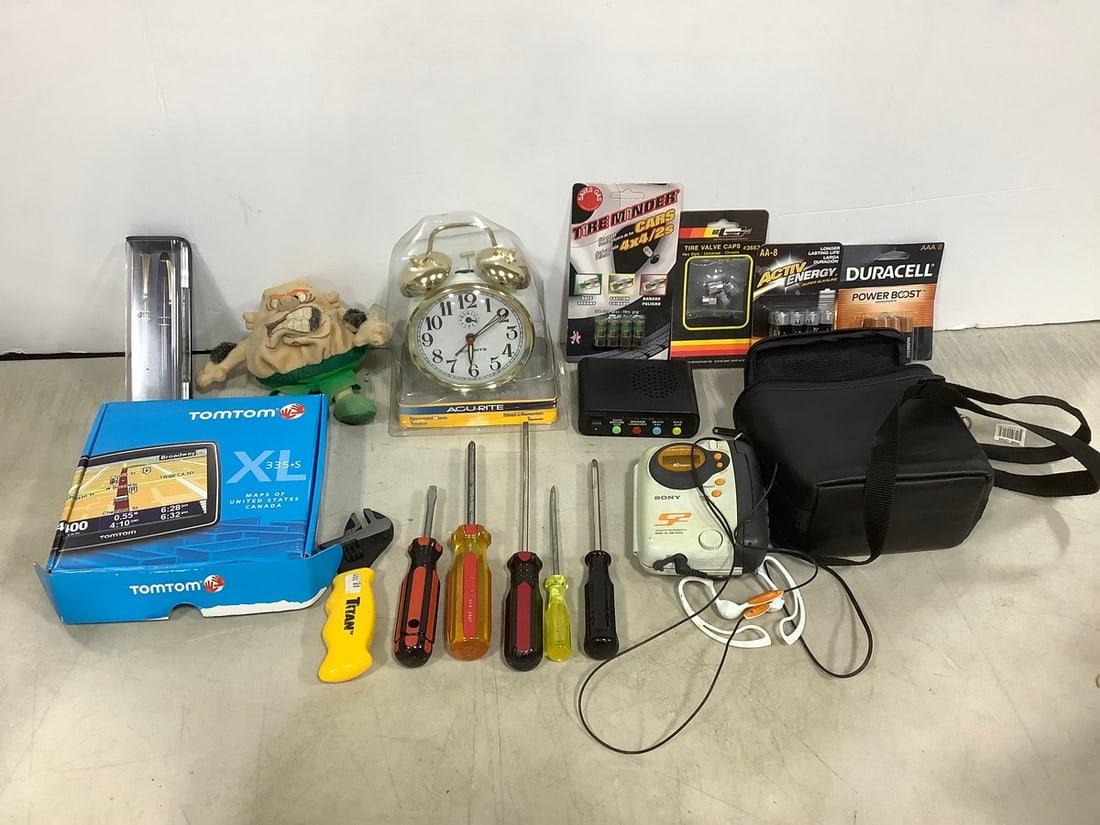 Acu rite clock, TomTom GPS, tire valve caps, and more (1 of 1)