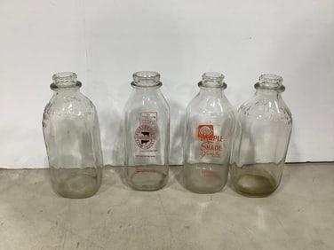 1 quart vintage milk bottles(various dairies-9in.tallest)