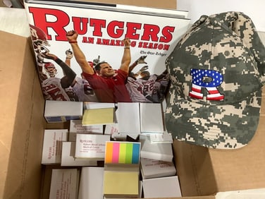 Rutgers book, hat, and sticky notes