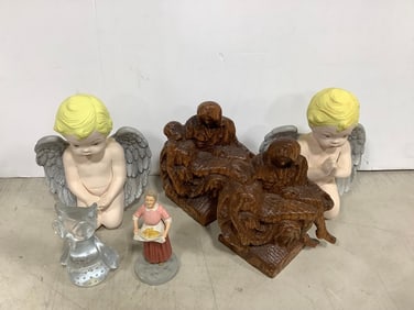 Angelic statues, wooden carved statues, and more