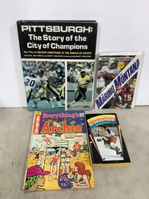 Various sports books and Archie comic