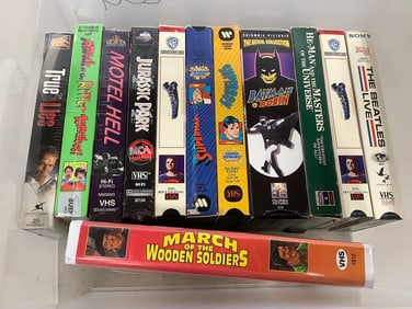 VHS tapes(March of the Wooden Soldiers, Jurassic Park, Superman, and more)