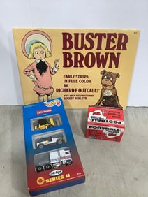 HotWheels cars, Buster Brown book, and 1989 traded stories football picture cards