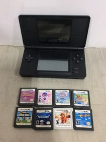 Nintendo DS with Games (Super Mario, Squinkies, and more)