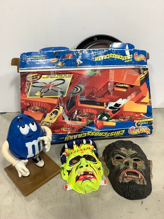 Party masks, HotWeels motorized criss cross crash set, and blue M&M dispenser: Party masks, HotWeels motorized criss cross crash set, and blue M&M dispenser