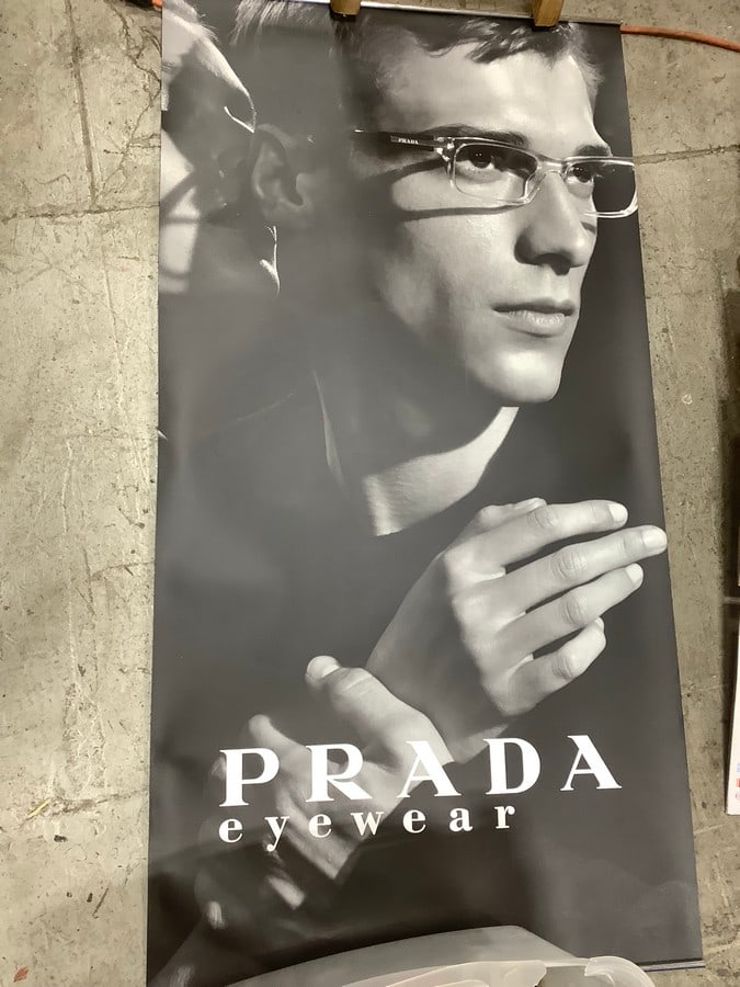 The Prada Eyewear Signage (27.5inx53.5in): The Prada Eyewear Signage (27.5inx53.5in)