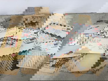 Vintage newspaper cutouts, envelopes, and more