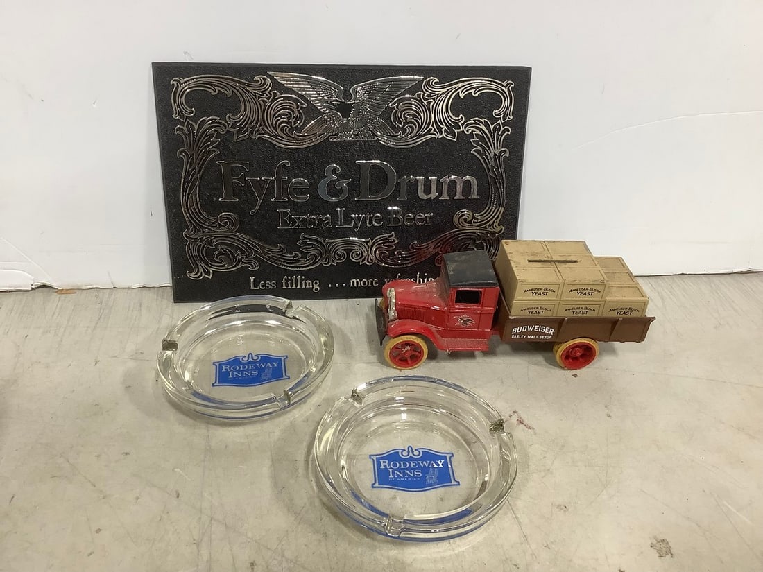 Fyfe & Drum beer sign(10.5in.x7in.), Rodeway inns glass ashtrays, and Budweiser coin bank: Fyfe & Drum beer sign(10.5in.x7in.), Rodeway inns glass ashtrays, and Budweiser coin bank