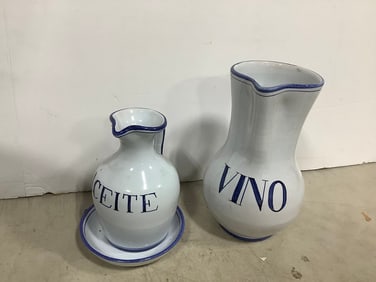 Set of 2 pottery pitchers(10.5in.tallest)