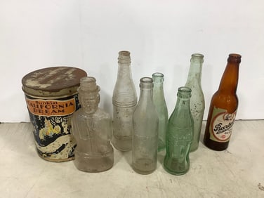 Vintage glass bottles and tin container(10in.tallest)