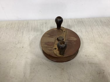 Vintage wooden and brass fishing reel