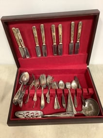 Vintage utensils in wooden case