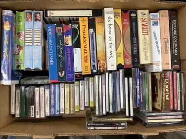 Various VHS Tapes, CDs, and more (Titanic, Ecplore Colorado, Frankie Valli, etc)