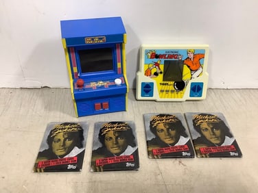 Michael Jackson collectible cards and handheld games(Pacman and electronic bowling)