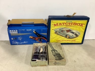 Matchbox car carrying case, king size Garvey no.2 price marking kit, and Roadrunner jumper cables