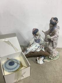 Lladro porcelain collectible statue(12in.tall-head slightly damaged)