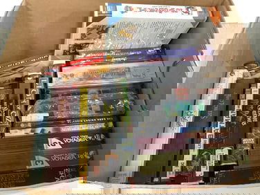 Various VHS Tapes and DVDs (Spiderman, Stranger Things, The Wizard of Oz, etc)