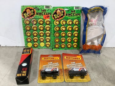 Matchbox cars, super bang ring caps, Dunlop 360-MX balls, and more