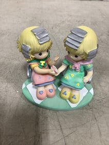 Precious Moments statue(3.5in.tall)