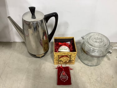 Farberware fully automatic percolator, vintage glass Pyrex percolator, and Christmas ornament