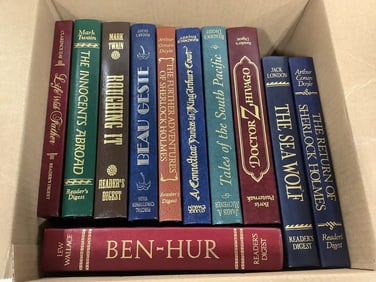 Various hardcover books(Tales of the South Pacific, The Sea Wolf, The Innocents Abroad, and more)