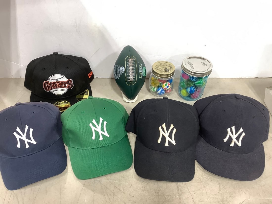 NY Yankees hats, bouncy balls, and NY Jets football (1 of 1)