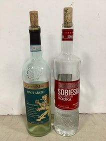 Sobieski Vodka 40% - 750 ml (half full) and Pinot Grigio White Wine 12% - 750 ml (half full)