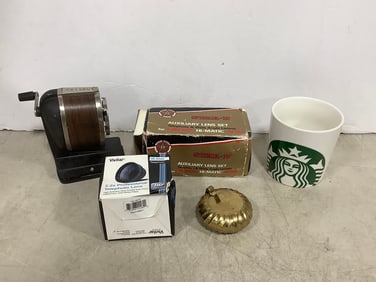 Starbucks mug, auxiliary lens set, Boston pencil sharpener, and more