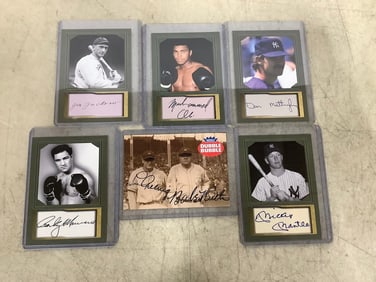 Collector's cards in plastic cases(Muhammad Ali, Don Mattingly,Mickey Mantle, and more)