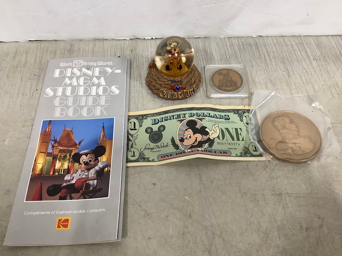 Vintage Disney brochure, Mickey Mouse cruise line snowglobe, Walt Disney token, and more (1 of 1)