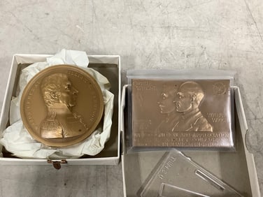 Large collectible coin and Orville Wright plaque