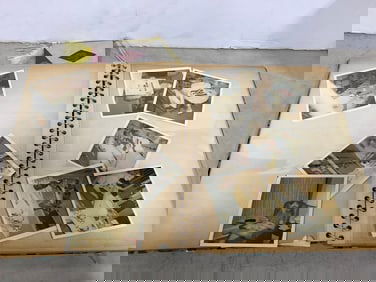 Vintage scrapbook with photographs inside