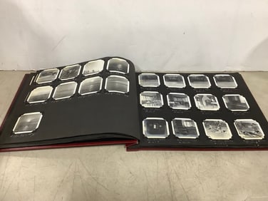 Vintage scrapbook with photographs inside