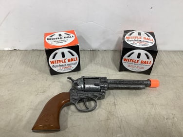 Wiffle balls and toy gun