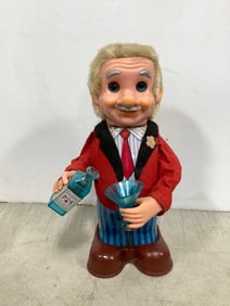 Vintage Blushing Willy bartender tin toy
