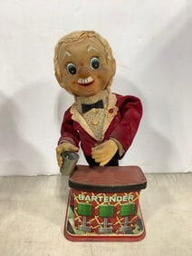 Vintage Charlie Weaver bartender tin toy